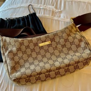 Vintage Gucci Tan small shoulder strap purse with gold hardware.
